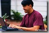 composing at laptop
